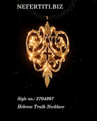 a gold necklace with the word neftibiz on it